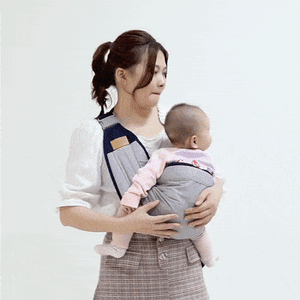 Woman using Clariom Baby Shoulder Carrier with breathable mesh and padded straps for comfort.